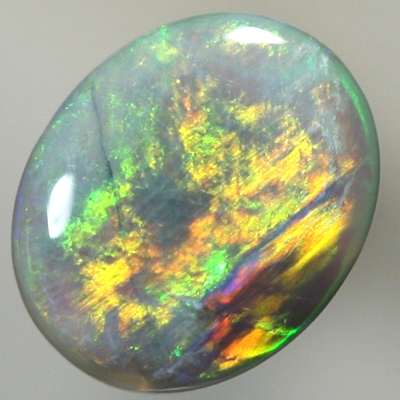SOLID SEMI BLACK OPAL Neon orange turns to neon green in a broad rolling flash